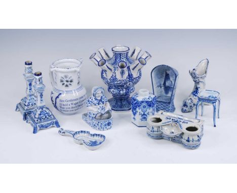 A collection of Delft blue and white items, each a reproduction of an 18th century design, 20th century, to include a nine no