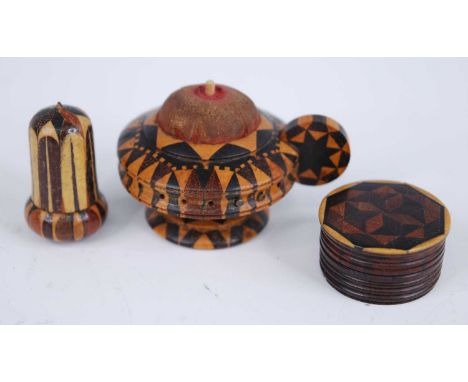 A Victorian rosewood miniature pin cushion, of squat circular form having a cushion top above a frieze with needle apertures,
