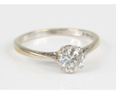 An 18ct white gold diamond solitaire ring, featuring a round brilliant cut diamond in an eight-claw setting, diamond dimensio