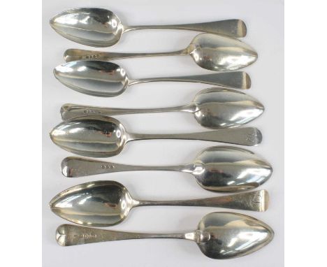 A collection of eight George III and later silver spoons, all in the Old English pattern with engraved terminals, makers to i