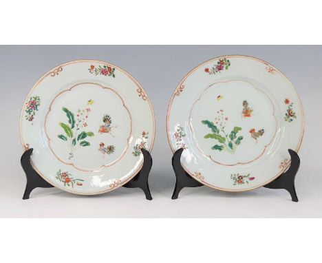 A pair of Chinese export porcelain plates, 18th century, each enamel decorated with roosters and flowers, dia.23cmThe enamel 