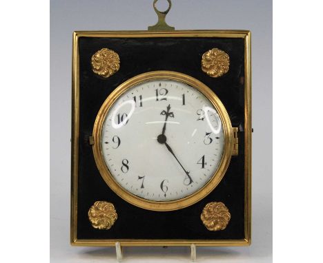 An antique wall or bedside clock, having a convex white enamel Arabic dial, dia.10cm, driven by a verge fusee watch movement,