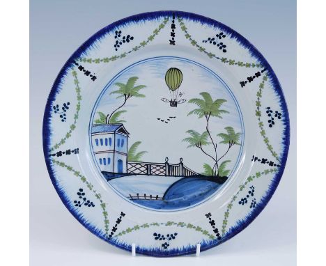 A Lambeth polychrome delftware plate, Thomas Morgan and Abigail Griffith, circa 1785, depicting the balloon ascent of Vincenz