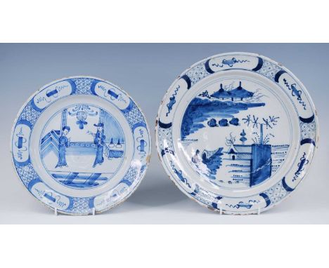 An English blue and white delftware charger, possibly Bristol, 18th century, decorated with pagodas, dia.35cm, together with 