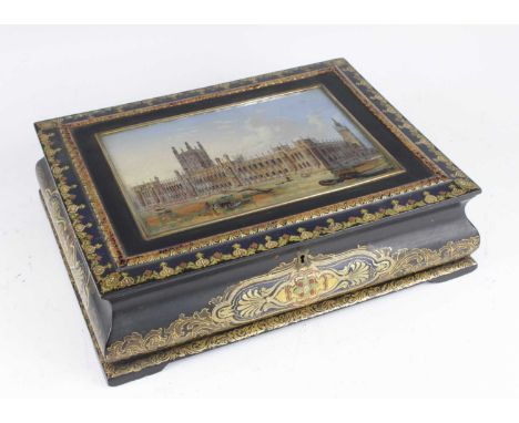 A Victorian papier-mâché deed or writing box, the hinged cover mother of pearl inset with The Houses of Parliament, opening t