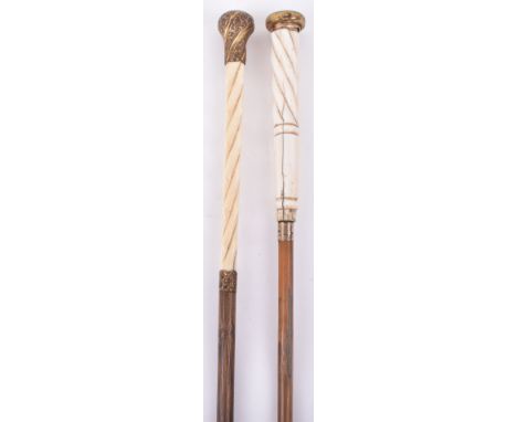 A 19th century ivory walking stick, with gold pommel decorated with acanthus leaves, over carved ivory handle and gold collar