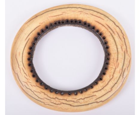 ^An 18th century African ivory slave bangle, 14cm