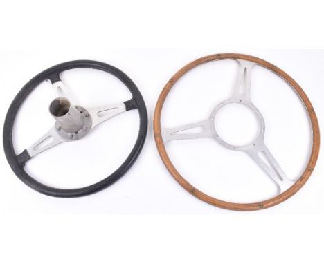 A 1960’s wood and aluminium three spoke steering wheel 43cm, with a vintage Magna steering wheel 38cm