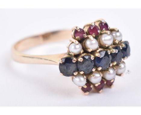 An 18ct gold sapphire, ruby and pearl ring, 4g