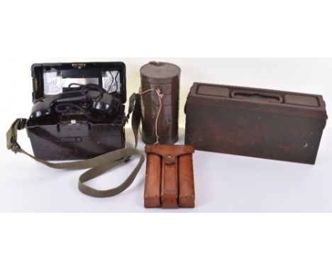 WW2 British Civilian Issue Gas Mask, housed in its original metal carry tin; German army field telephone; German ammunition t