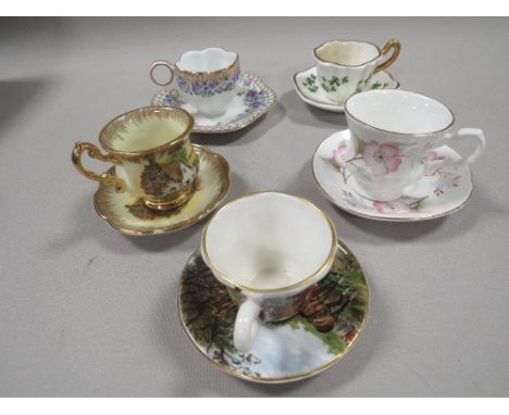 A TRAY OF 20 MINATURE CUPS AND SAUCERS TO INCLUDE WEDGWOOD, LIMOGES ETC 