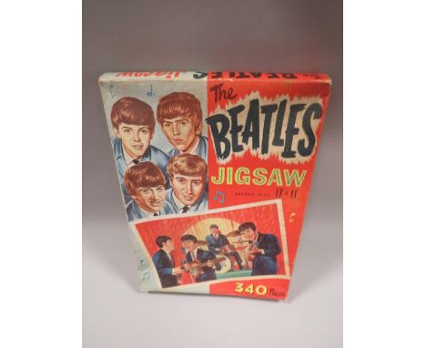 A VINTAGE BEATLES JIGSAW BY NEMS ENTERPRISE LTD 