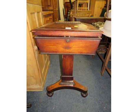 A 19TH CENTURY MAHOGANY TEAPOY ON TRIPOD STAND 