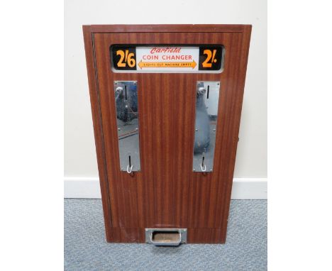 A VINTAGE CARFIELD WALL MOUNTED ARCADE COIN CHANGER MACHINE, wood case with chrome fittings, slots for half crown and two shi