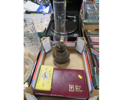 A VINTAGE PARAFFIN LAMP TOGETHER WITH A BOOK OF FIRST DAY COVERS ETC