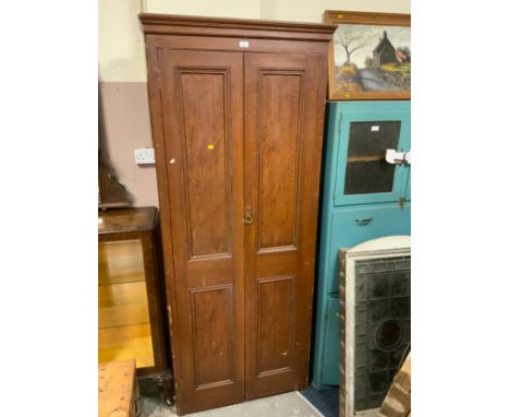 A vintage tall, two door 19th century school style cupboard H 212 cm 