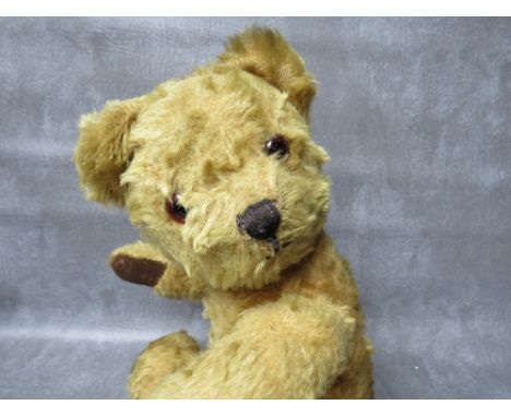 A MID CENTURY VINTAGE MOHAIR  TEDDY BEAR WITH BELLS TO EARS, fully jointed, velvet pads, H 39 cm 