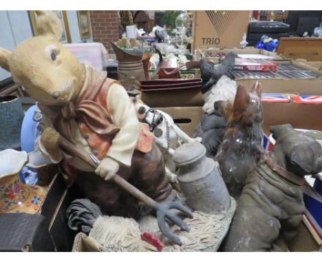 A TRAY OF ASSORTED CERAMIC AND RESIN ANIMAL FIGURES TO INCLUDE A SAUSAGE DOG BOOT SCRAPER 