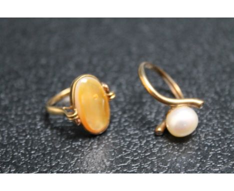 A HALLMARKED 9 CARAT CULTURED PEARL AND DIAMOND RING, approx weight 3.4g, ring size O, together with another 9 carat example 