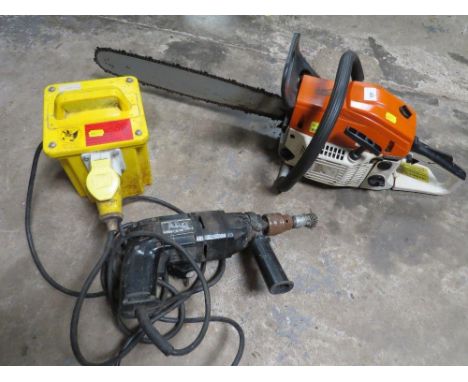 A 110v TRANSFORMER TOGETHER WITH A PETROL CHAINSAW 