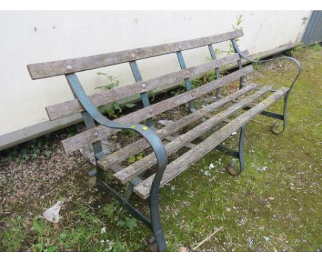 A VINTAGE WROUGHT IRON AND WOODEN GARDEN BENCH 