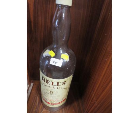 A LARGE EMPTY BELLS SCOTCH WHISKY BOTTLE 