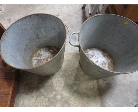 TWO VINTAGE GALVANISED TUBS MARKED S.W.R WITH EIIR CYPHER ABOVE, EACH WITH TAPERED SIDES AND LOOP HANDLES H 36CM 