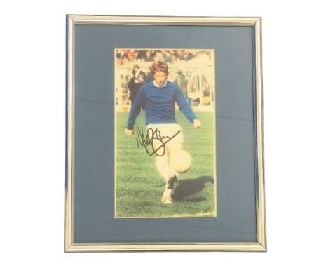Alan Ball signed colour photo playing for Everton. Mounted and signed. Measures 14x11 inch appx. Good condition. All autograp