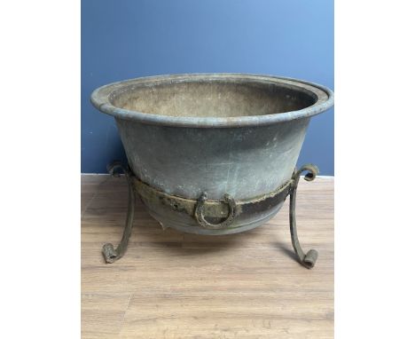 A large copper in blacksmith-made iron stand - horse shoe detail.
Makes excellent garden planter / jardiniere
76 cm diameter 