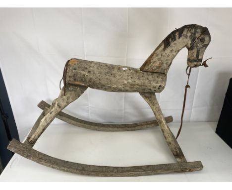 A primitive folk art Swedish rocking horse
H69 x W88 x D41 cm