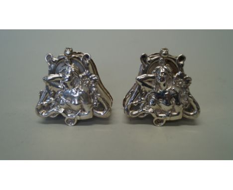 A pair of Art Nouveau silver boxes, by William Hutton & Sons Ltd, Birmingham 1901, the hinged lids decorated female bust and 