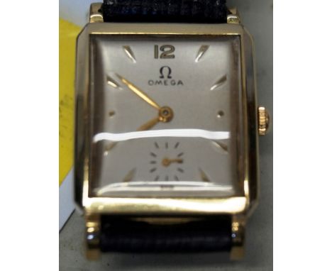 A circa 1950 Omega Calibre gentleman's wristwatch, R17.8AM, rectangular dial, manual wind, on black leather strap, serial num