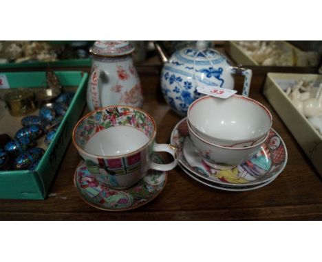 A small group of Chinese porcelain, 18th and 19th centuries, comprising: a silver mounted blue and white teapot and cover, 10