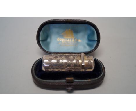 A Victorian cylindrical silver scent flask, by Walter & George Myers, Birmingham 1893, 4.8cm, in original fitted leather case