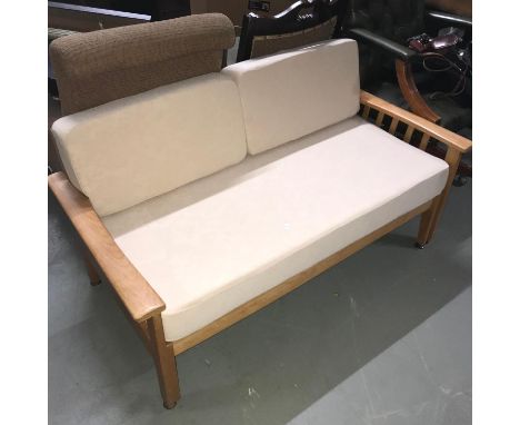 A 1970's Scandinavia light wood bed settee. 