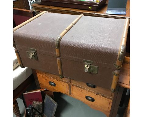 A Vintage wooden bound steamer trunk. 