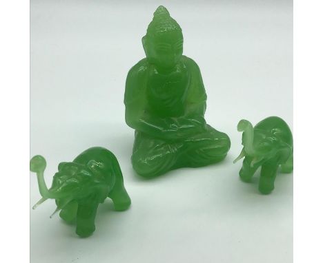 A lot of three jade coloured glass items to include; two elephants &amp; a Thai Buddha figurine