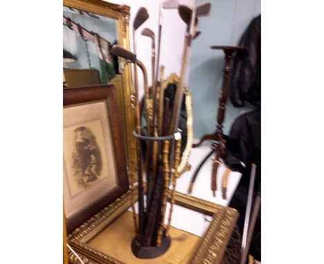 A Vintage Metal and bamboo Walking Stick Stand with Hickory shafted golf Clubs and Walking Sticks. This lot also includes a M