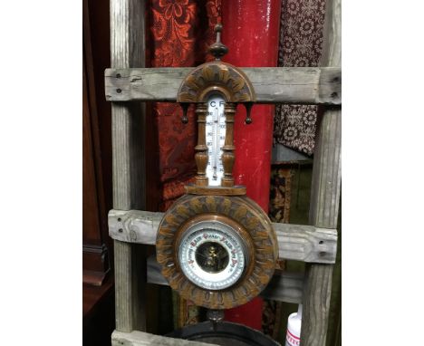 A Vintage wall barometer with mercury thermometer. Measures 47cm in length 