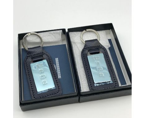 Two Sheffield silver Posh Club key ring ingots. Come with boxes and certificates