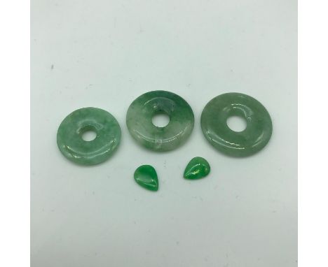 A Lot of 5 pieces of Jade/ Jadeite stones. Largest measures 2cm in diameter