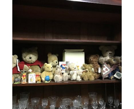 A shelf filled with vintage teddies and ornaments to include Steiff, Mohair bears and Classic Winnie The Pooh etc 