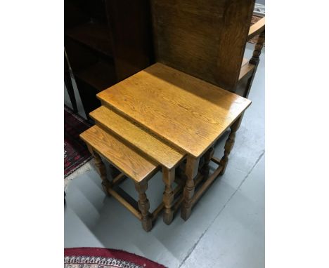 A nest of three light oak tables [H- 50cm] 
