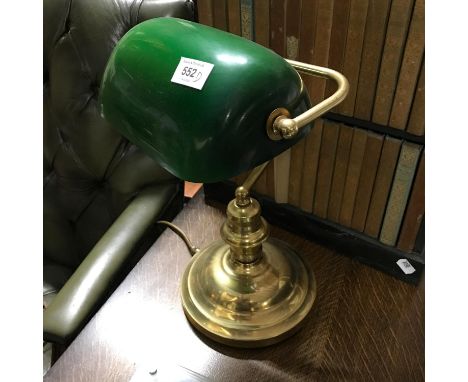 A Vintage desk lamp designed with green glass shade. 