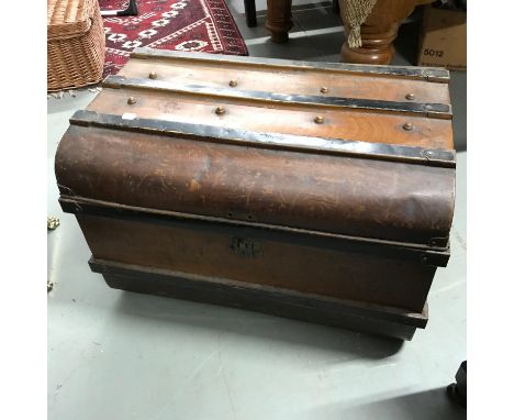 A Vintage metal travel trunk. 