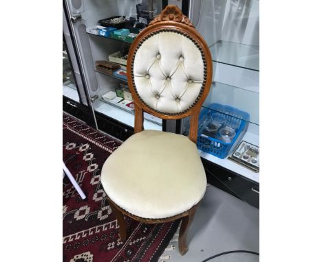 A Reproduction button back dressing table chair. 