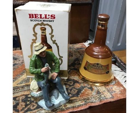 A Royal Doulton figurine 'A Good Catch' [HN2258] [Copr, 1965], together with Bells scotch whisky decanter [F.S.B] 