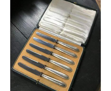 A Set of 6 Sheffield silver handle butter knives with box. 