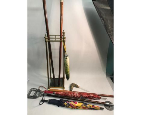 Antique gilt brass stick stand together with various Deco style umbrellas, Brass horse head and drinking vessel walking stick