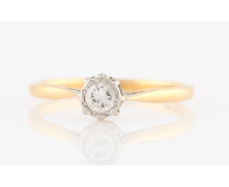 A diamond solitaire ring, set with a central round brilliant cut diamond, measuring approx. 0.20ct, stamped 18ct PLAT, ring s